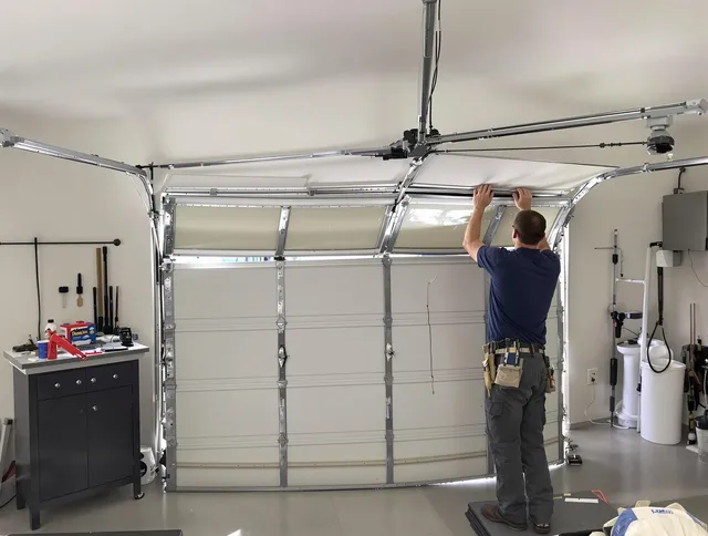 Norco Garage Door Repair specialist performing precise section replacement on Norco garage door