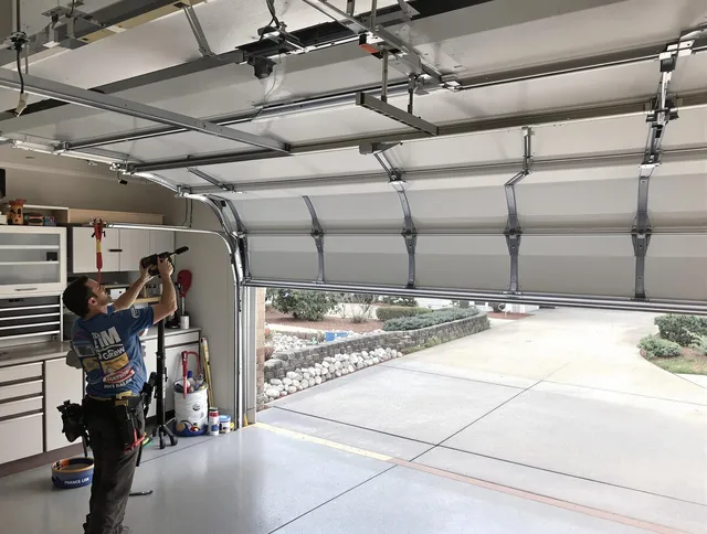 Garage door track repair service by Norco Garage Door Repair in Norco